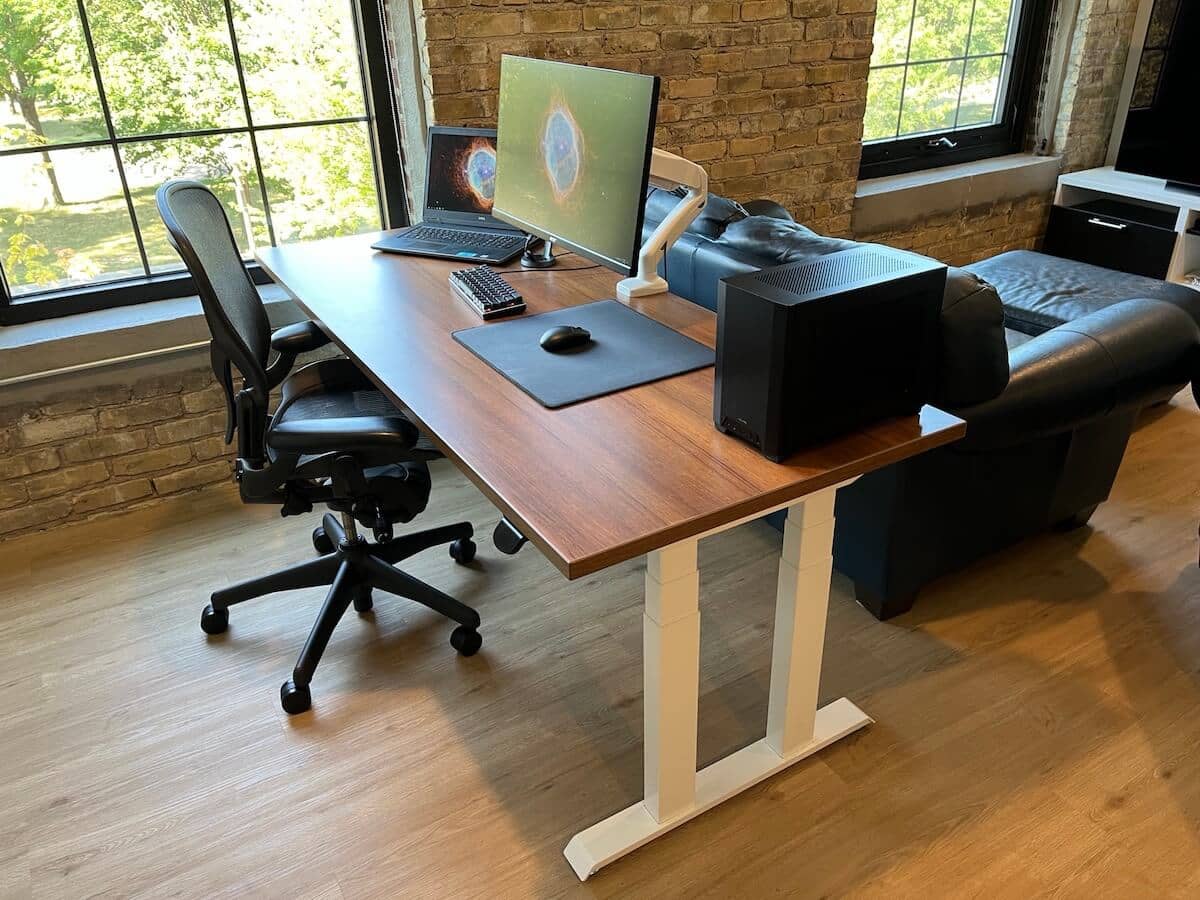 Uplift Desk Walnut Laminate (42 X 24 Inch) Standing Desk 2-Leg  V2-Commercial Adjustable Stand Up C-Frame (Industrial Style), Advanced  Keypad, Wire