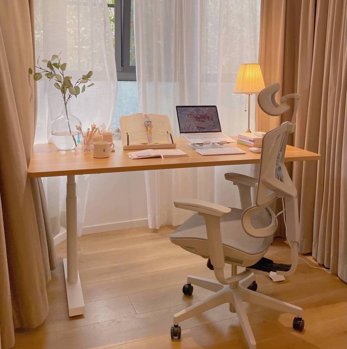 a mesh chair and standing desk